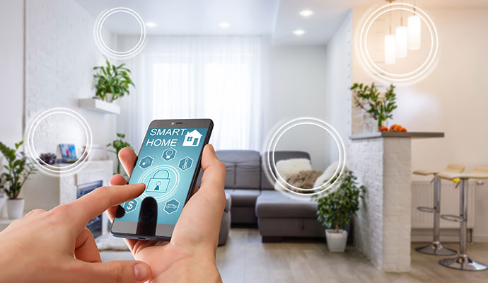 Person using a smartphone app to manage smart home automation and security controls