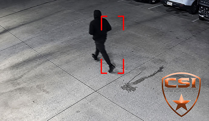 Night video surveillance footage showing burglary detection motion tracking