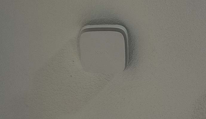 Carbon monoxide detector installed on a residential wall