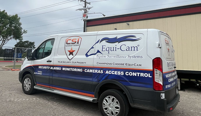 Custom Security Integrated service van with company branding parked outside